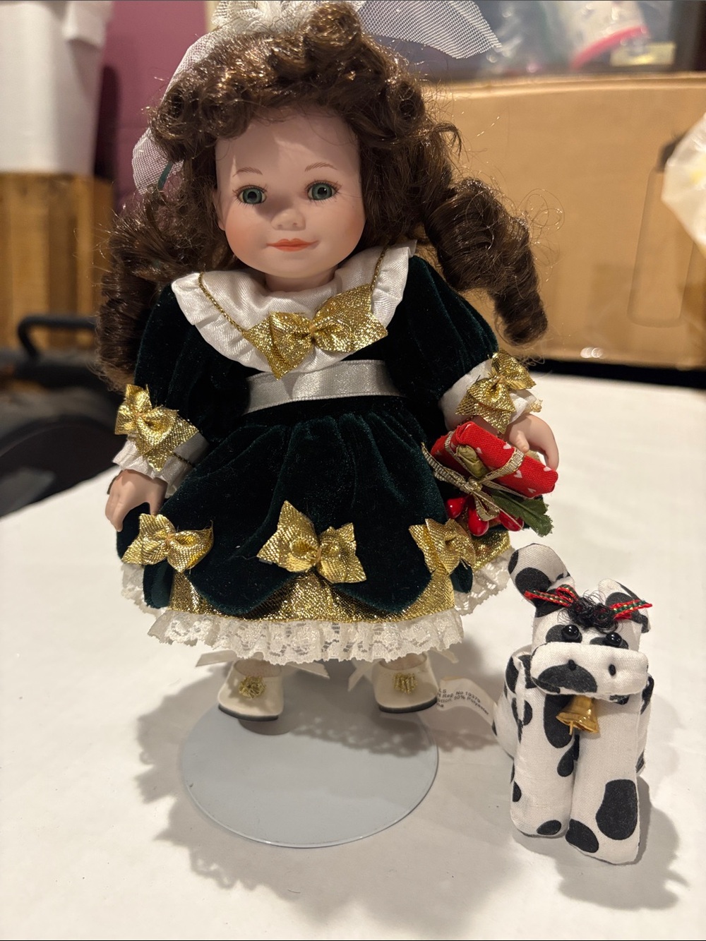 Velvet Holiday porcelain doll with Gold Bow Accents